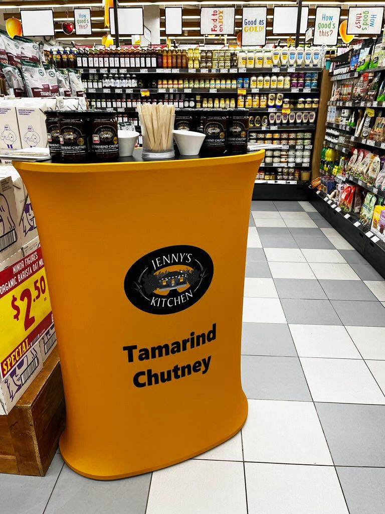 Portable oblong display counter in supermarket demo